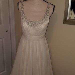 One of a kind cream pearl dress worn once